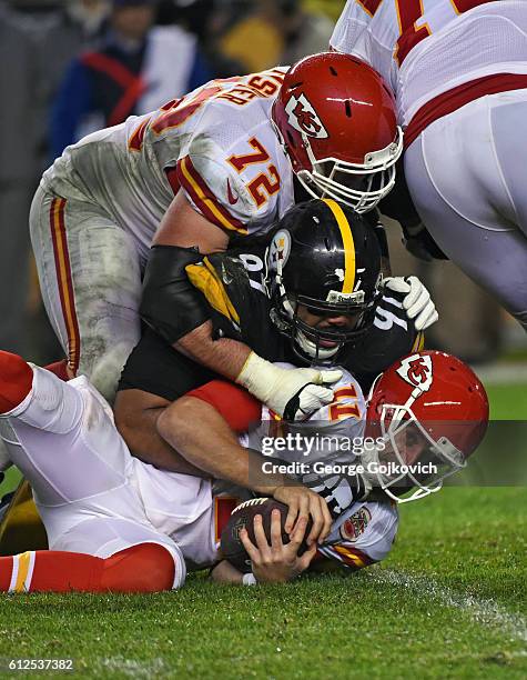 Defensive lineman Cameron Heyward of the Pittsburgh Steelers sacks quarterback Alex Smith of the Kansas City Chiefs as offense lineman Eric Fisher...