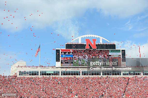 Fans of the Nebraska Cornhuskers release balloons after the first score against the Illinois Fighting Illini at Memorial Stadium on October 1, 2016...