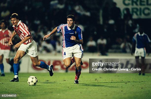French soccer player Zinedine Zidane during his first cap match with the French national football team on 17 August 1994, coming on as substitute in...