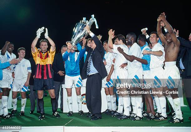 Podium of the Champions Cup final, season 1992-1993 between Marseille and AC Milan. Marseille won 1-0. Marseille's coach Raymond Goethals is holding...