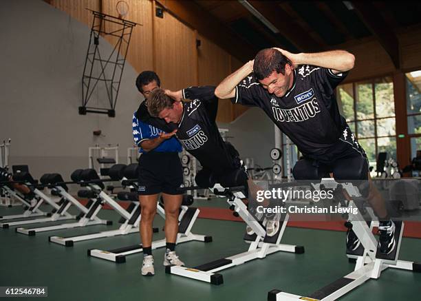 French soccer players Didier Deschamps and Zinedine Zidane in the gym during a training session for Juventus Turin, season 1996-1997.