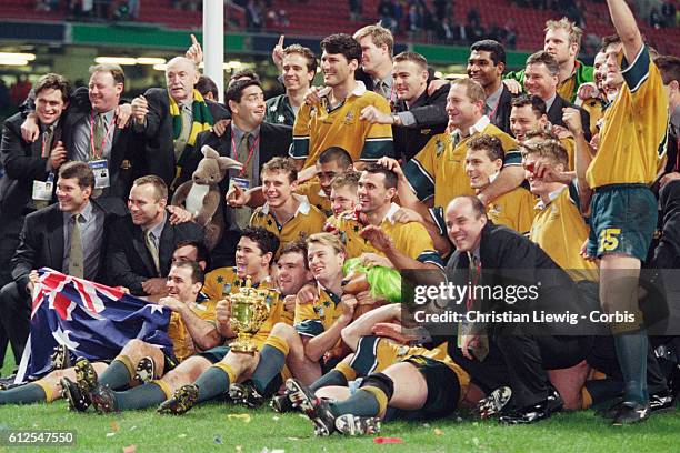 Australian players celebrate their victory in the 1999 Rugby Union World Cup final against France. Australia won 35-12.