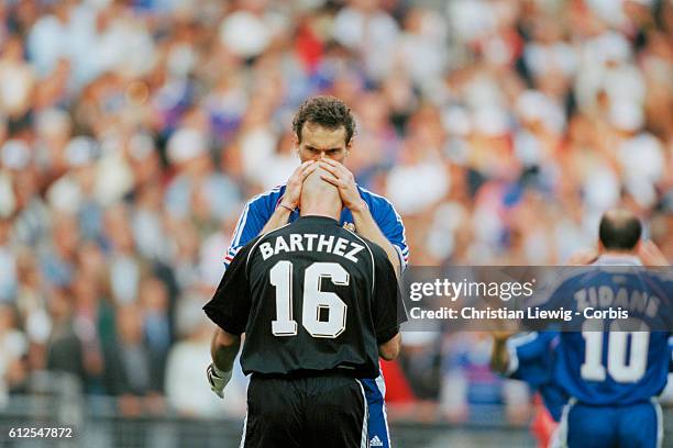 Laurent Blanc kisses French goalkeeper Fabien Barthez on the head after France's victory over Croatia in the 1998 soccer World Cup semifinal. |...