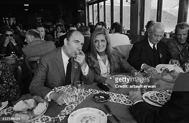 French socialist leader Francois Mitterrand has lunch with Egyptian-born singer Dalida in Chateau Chinon.