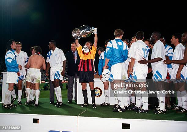 Podium of the Champions Cup Final, season 1992-1993 between Marseille and AC Milan, won by Mareille 1-0. Marseille goalkeeper Fabien Barthez holding...
