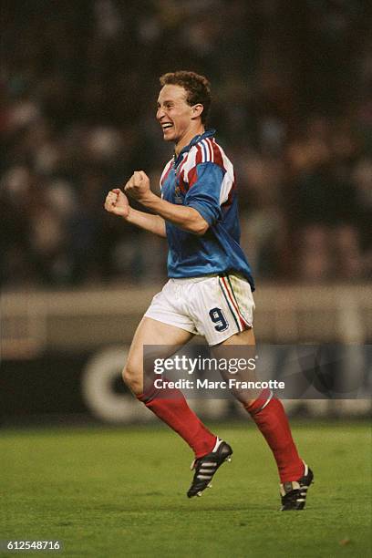 Jean-Pierre Papin celebrates scoring a goal for France during a game against Czechoslovakia.