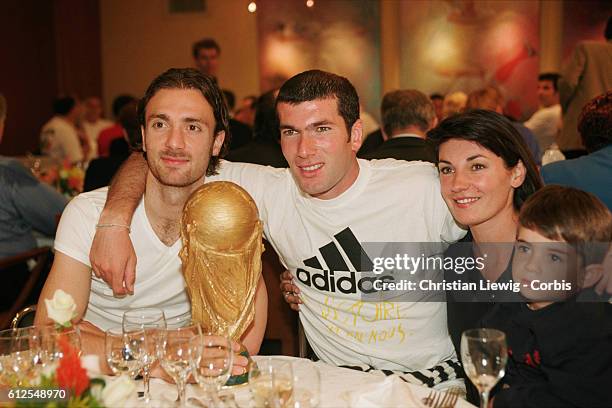 France's players are received at the French soccer federation after their 3-0 victory over Brazil in the final of the 1998 FIFA World Cup. Christophe...
