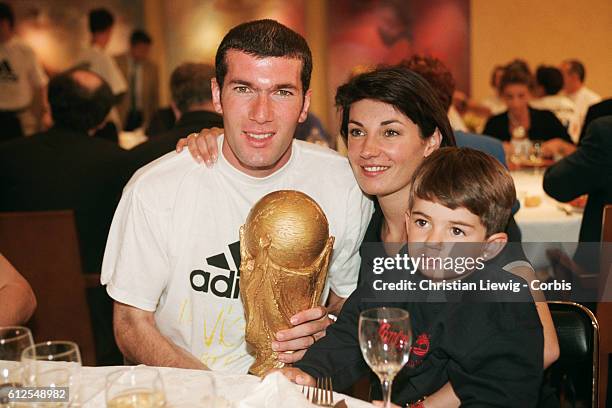 France's players are received at the French soccer federation after their 3-0 victory over Brazil in the final of the 1998 FIFA World Cup. Zinedine...