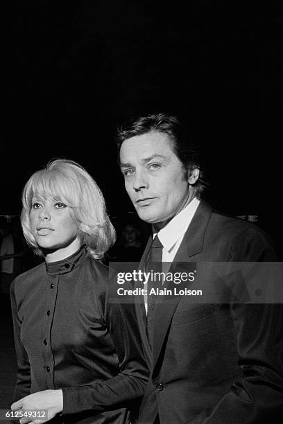 French actors and partners Mireille Darc and Alain Delon attend the premiere of the movie La Sirene du Mississipi, written and directed by Francois...