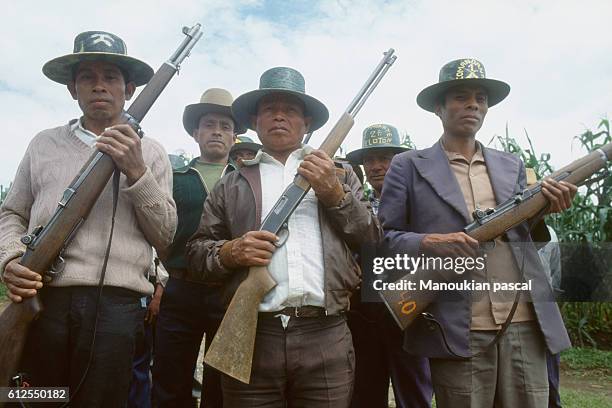 Members of the civil self-defence patrol group . An auxiliary body of the armed forces, this paramilitary group was initiated by General Rios Montt's...