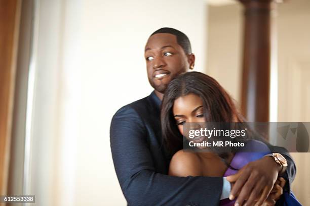 Basketball player Dwyane Wade and actress Gabrielle Union are photographed for Essence Magazine on November 14, 2011 in Los Angeles, California.