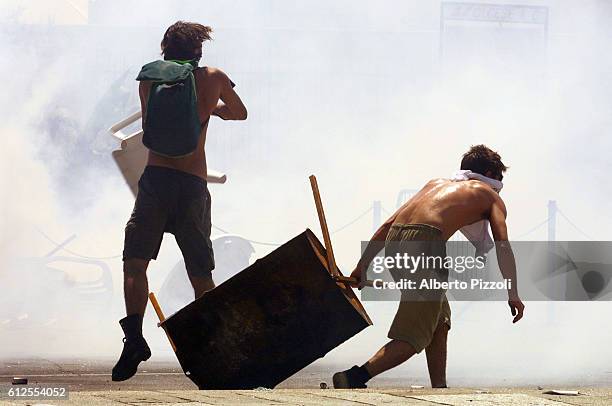 Riots on the second day of the G8 Summit in Genoa:violent clashes broke out between the anti-globalization demonstrators and the Italian police.