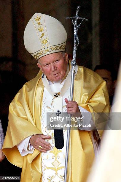 The Pope celebrated mass in front of the Basilica of St. John Lateran and then led the procession from St. John's Basilica to the Basilica of St....