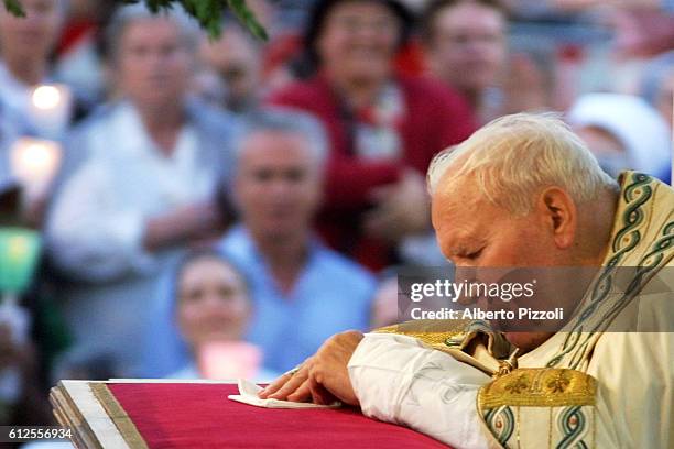 The Pope celebrated mass in front of the Basilica of St. John Lateran and then led the procession from St. John's Basilica to the Basilica of St....