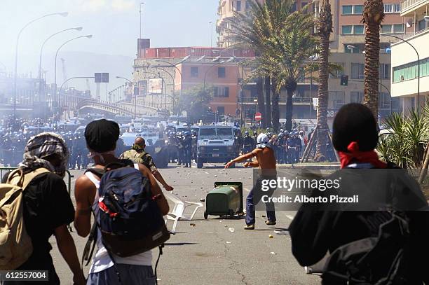 Riots on the second day of the G8 Summit in Genoa:violent clashes broke out between the anti-globalization demonstrators and the Italian police.