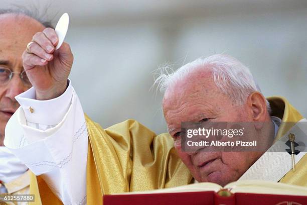 The Pope celebrated mass in front of the Basilica of St. John Lateran and then led the procession from St. John's Basilica to the Basilica of St....