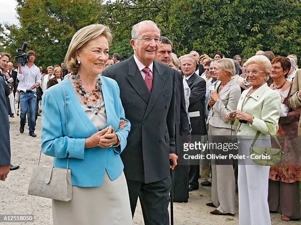 Belgian Queen Paola and King Albert II arrive at the Queen's 70th birthday party, at Laeken Royal Palace in Brussels.