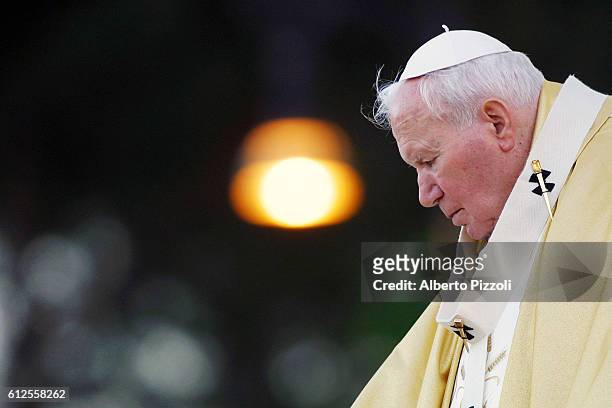 The Pope celebrated mass in front of the Basilica of St. John Lateran and then led the procession from St. John's Basilica to the Basilica of St....