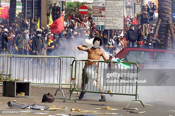 Riots on the second day of the G8 Summit in Genoa:violent clashes broke out between the anti-globalization demonstrators and the Italian police.