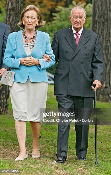 Belgian Queen Paola and King Albert II arrive at the Queen's 70th birthday party, at Laeken Royal Palace in Brussels.