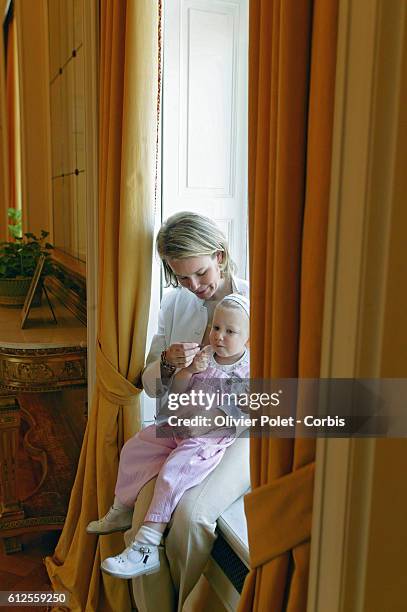 Belgian Princess Mathilde with daughter, Princess Elizabeth in her office at the Brussels Palace.