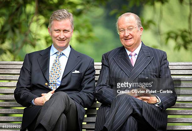 Prince Philippe pictured with his father King Albert II of Belgium during a photo session with the members of the Royal family at the Royal castle in...