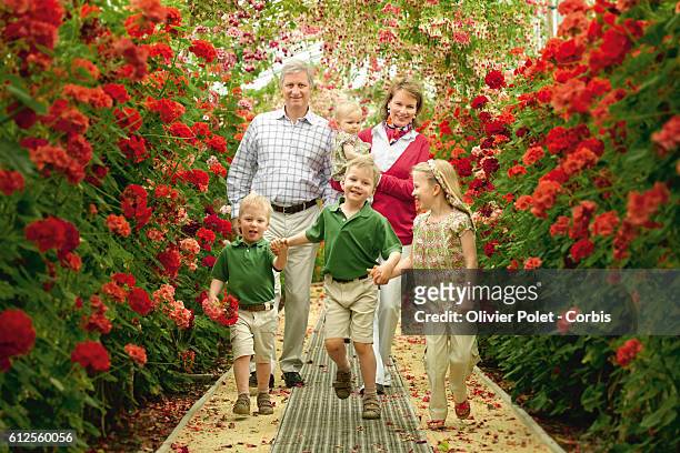 Prince Philippe and Princess Mathilde of Belgium and their children Emmanuel , Gabriel , Eleonore and Elisabeth walking through the royal greenhouse...