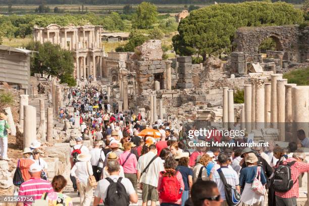 tourists walking along curetes street - türkiye country stock pictures, royalty-free photos & images