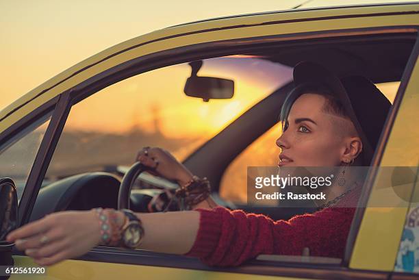 creative person portrait in car - new hairstyle stock pictures, royalty-free photos & images