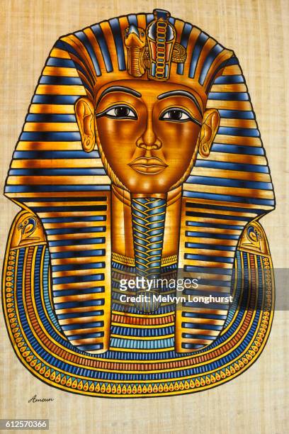 painting of tutankhamun's death mask on papyrus paper, cairo, egypt - tutankhamun stock illustrations