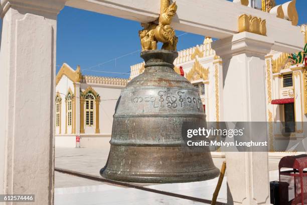 large bell at botataung pagoda, buddha's first sacred hair relic pagoda, yangon, (rangoon), myanmar, - rangun stock pictures, royalty-free photos & images