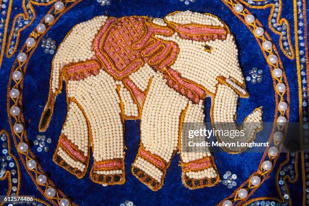 beaded cushion depicting an elephant, myanmar, (burma) - white elephant stock pictures, royalty-free photos & images