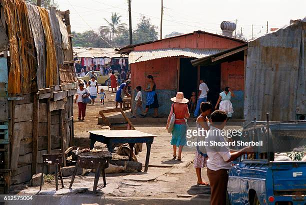 Old buildings line an outdoor market in Managua, Nicaragua's capital city. Rising to power within the Nicaraguan government in the 1980s, the...