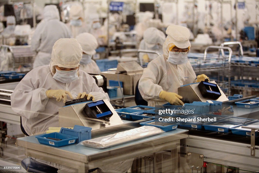 Cd Factory Assembly Line The hard drive assembly line of Western Digital Corporations. News ...