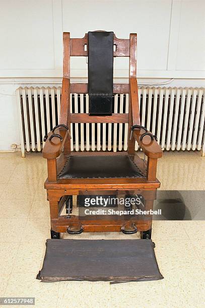 An empty electric chair in the death chamber of Indiana State Penitentiary.