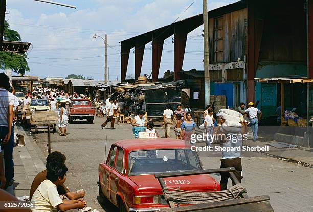 Busy outdoor market in Managua, Nicaragua's capital city. Rising to power within the Nicaraguan government in the 1980s, the left-wing Sandinista...