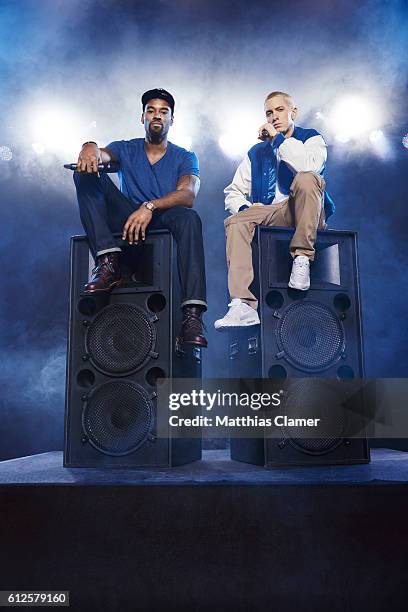 Rapper Eminem and football player Calvin Johnson are photographed for ESPN Magazine, The Music Issue on December 17, 2013 at St Andrews Theater in...
