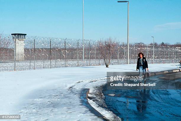 The barbed wire fence at Buckingham Correctional Institution, a maximum security prison. --- Photo by Shepard Sherbell/Corbis SABA