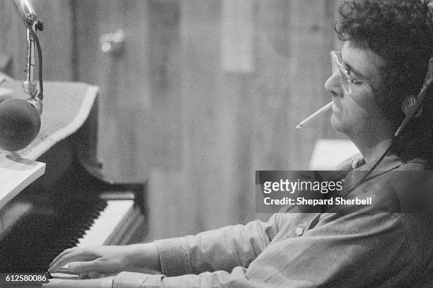 Musician Randy Newman playing the piano during recording sessions for Good Old Boys at Amigo Studios in Los Angeles.