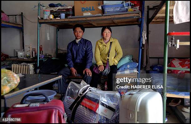 The young couple awaits in a dormitory for the manager's instructions. The newly-weds will be separated in two different dormitories. Each dormitory...