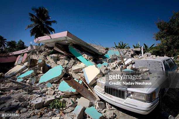 Limousine is buried under the rubble of a hotel in the city of Leogane , south of Haiti's capital Port-au-Prince on January 29, 2010.