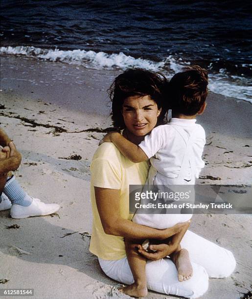 First Lady Jacqueline Lee "Jackie" Bouvier Kennedy with her son John F. Kennedy Jr. In Hyannis Port, in 1964, sometime after the President's...
