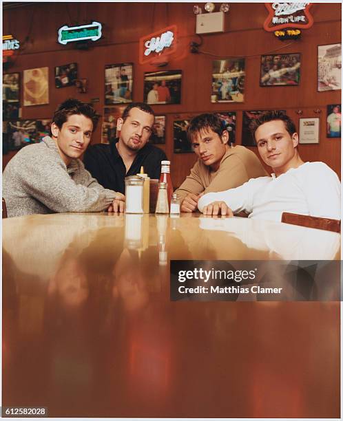 Nick Lachey, Drew Lachey, Justin Jeffre and Jeff Timmons of 98 Degrees