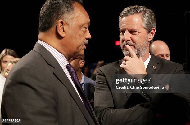 Jesse Jackson and Jerry Falwell Jr. Speak prior at the Vice Presidential Debate between Democratic vice presidential nominee Tim Kaine and Republican...