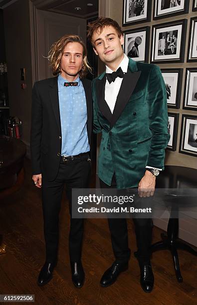 Dougie Poynter and Douglas Booth attend the IWC Schaffhausen Dinner in Honour of the BFI at Rosewood London on October 4, 2016 in London, England.