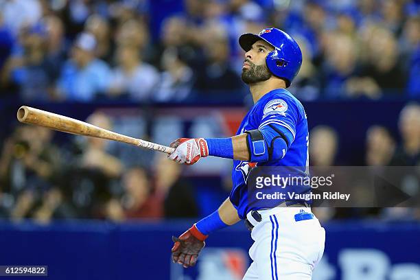 Jose Bautista of the Toronto Blue Jays reacts after hitting a solo home run in the second inning against the Baltimore Orioles during the American...