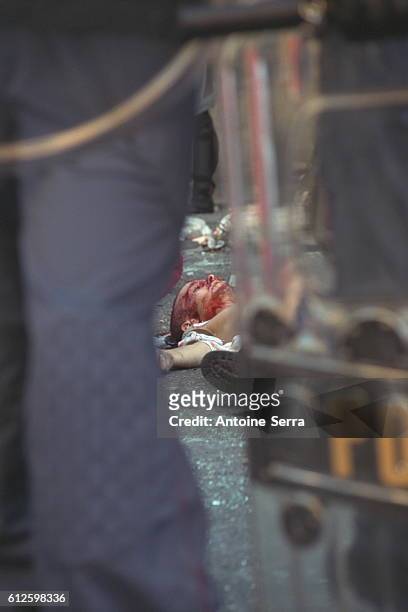 Young protester was shot dead by a member of the carabinieri, during the anti-globalization riots which took place during the G8 Summit.
