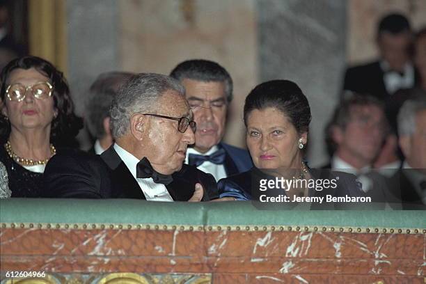 Henry Kissinger and Simone Veil at Riccardo Muti's charity concert at the Chateau de Versailles.