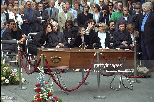 The Gelin family in front of Xavier's coffin.