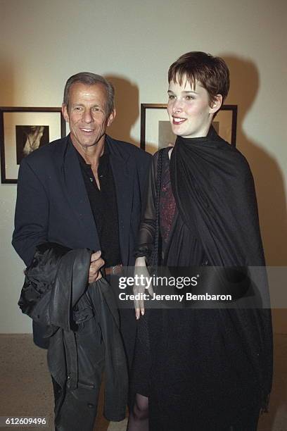 Emilie who is the wife of singer Bryan Adams here seen with photographer Peter Beard.